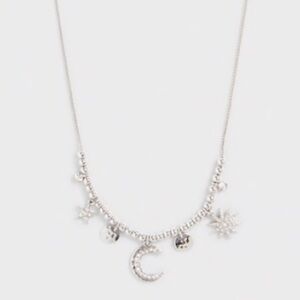 Silver tone sun, moon & star adjustable necklace